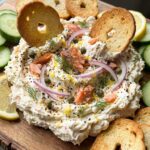 Smoked Salmon Bagel Dip on beige countertop